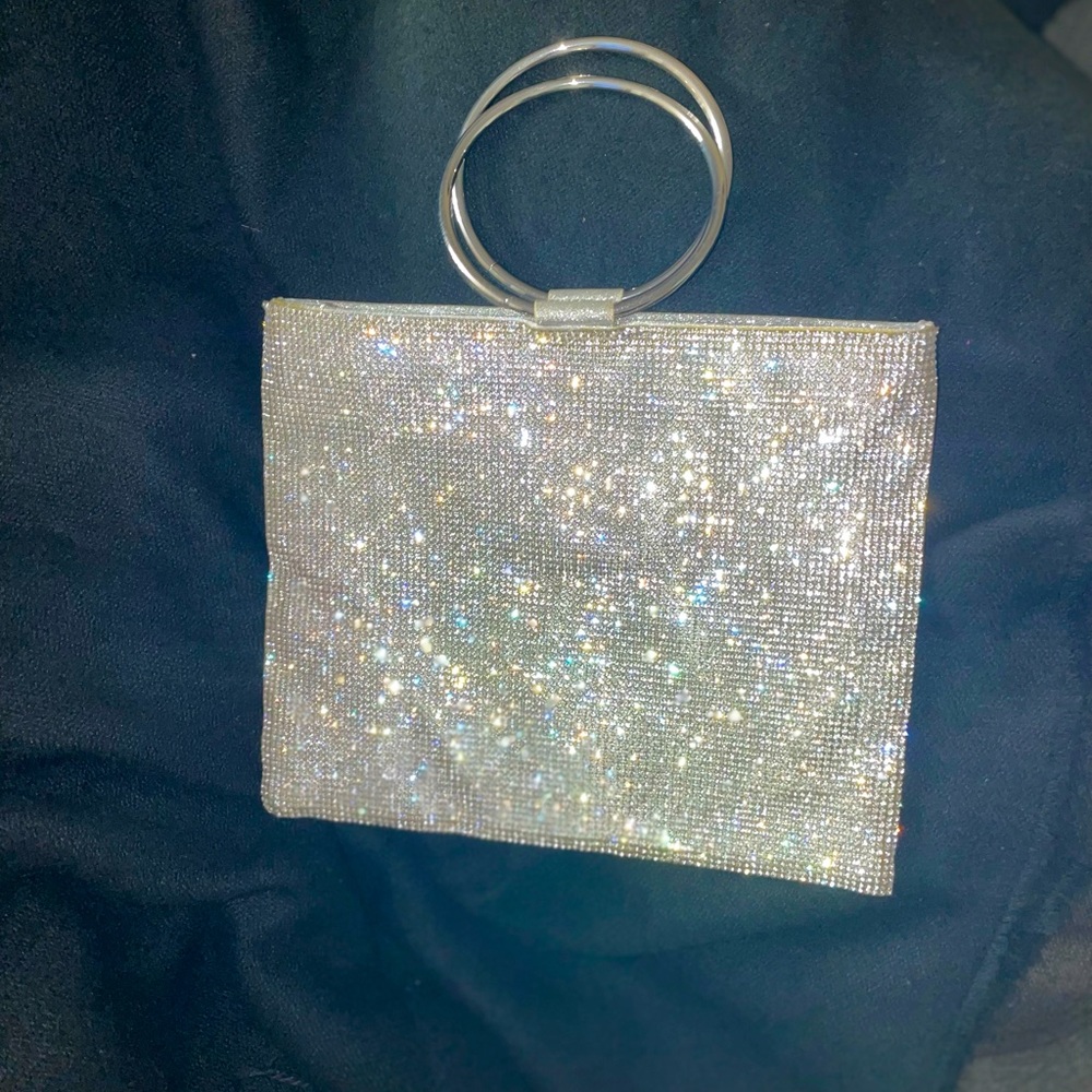 Nina silver rhinestone clutch with additional chain strap & cord strap.